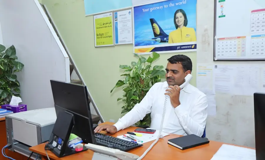 A travel consultant at work at the New Diamond desk
