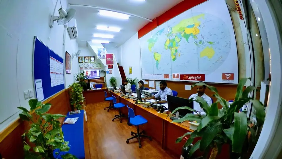 Inside the office with the world map wall